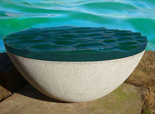 The Sea Between Us by Alena Matejka. Cast glass and granite.